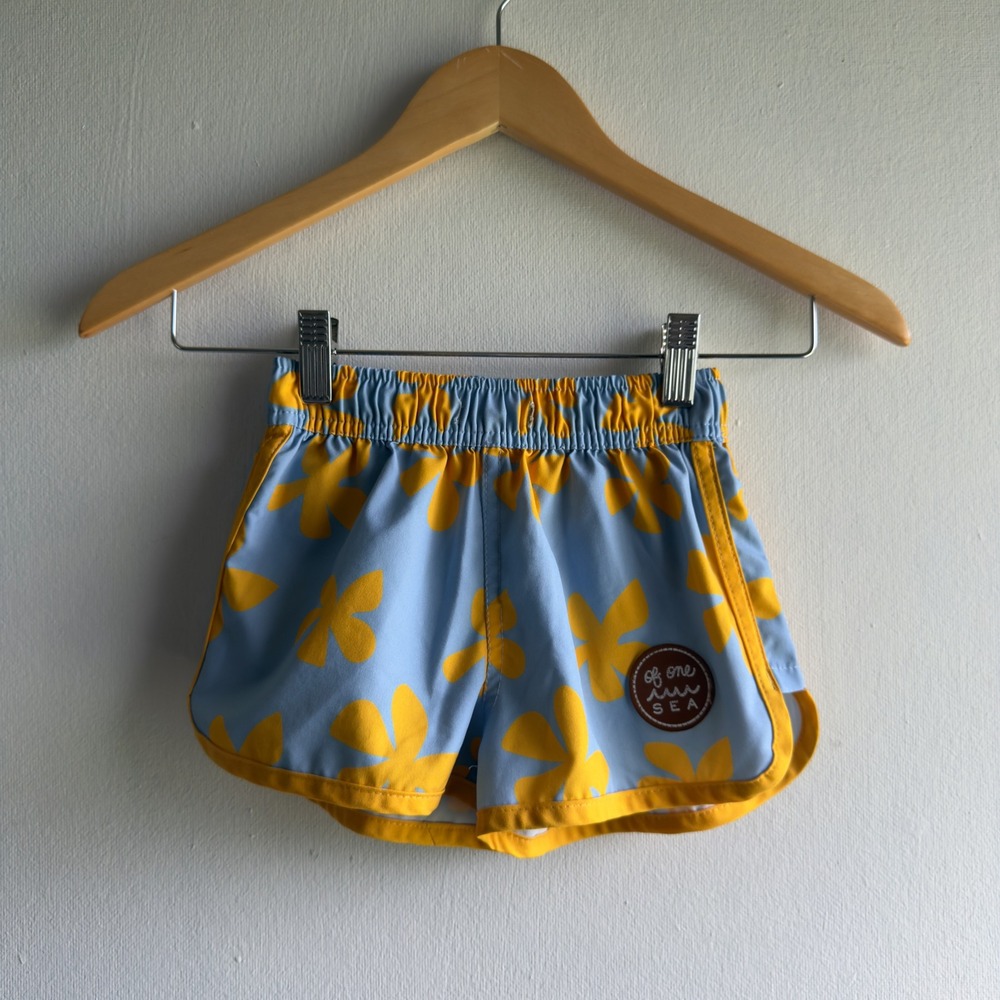 Of One Sea Board Shorts Kids 5/6 Blue Yellow Floral Swim Trunks
